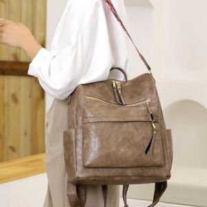 Dark brown vegan leather zipper detail mini backpacks